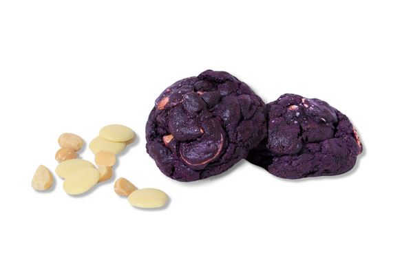 Two Ube cookies with white chocolate and macadamia nuts